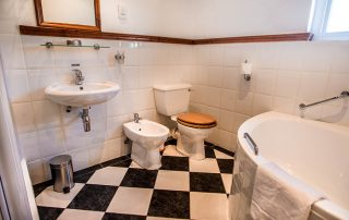 Hotel ensuite bathroom checked floors